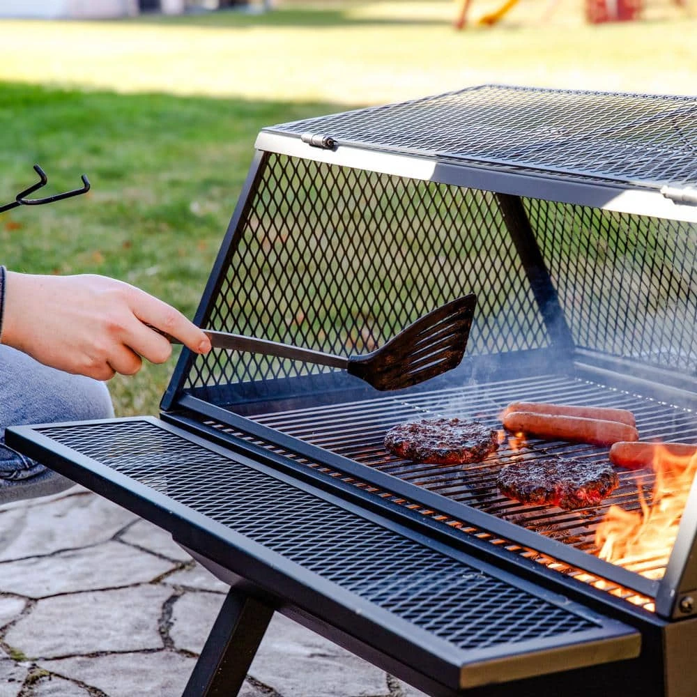 Steel Grilling Fire Pit With Cooking Grate And Spark Screen 4 Steel Grilling Fire Pit With Cooking Grate And Spark Screen - Image 4