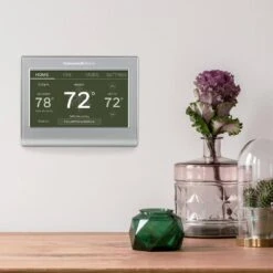 Wi-Fi Smart Color 7-Day Programmable Smart Thermostat With Color-Changing Touchscreen Display 21 Wi-Fi Smart Color 7-Day Programmable Smart Thermostat With Color-Changing Touchscreen Display -Fire Place Store metallic honeywell home programmable thermostats rth9585wf 4f 1000